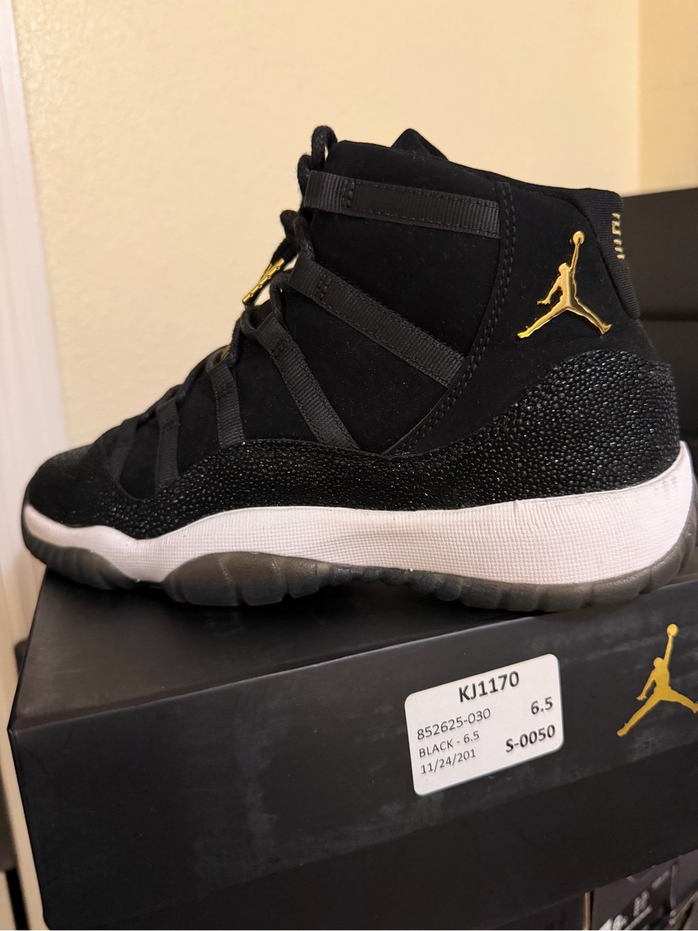 Jordan Black and Gold High-Top Basketball Sneakers
